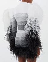 Handmade knit jacket with feather detail